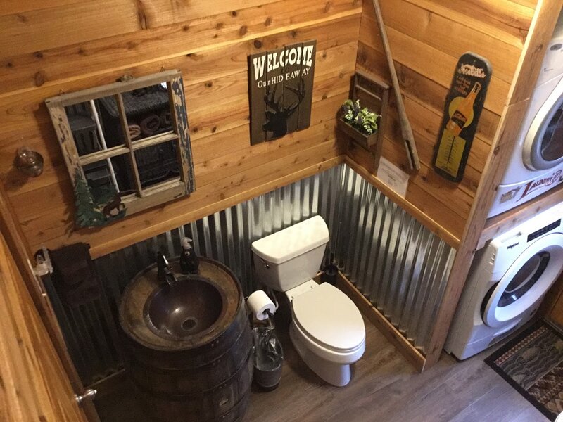 Rustic bathroom with laundry