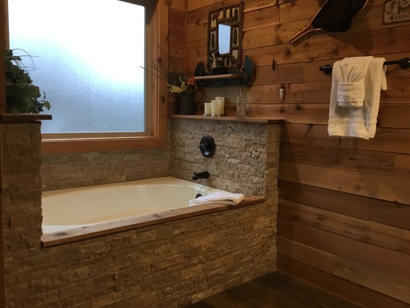 Bathtub with stone